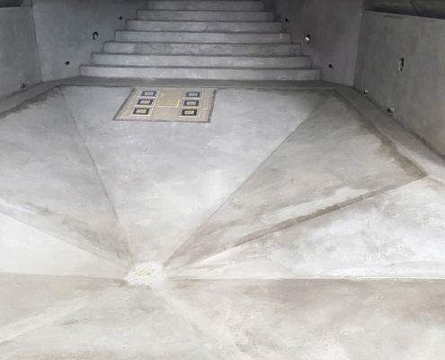Rhabillage de toutes les surfaces et mise en forme des pentes au mortier de réparation du béton R4
